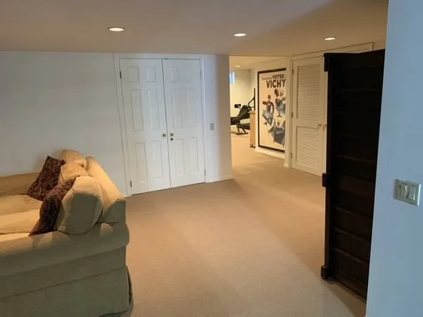 a view of swimming pool with seating space