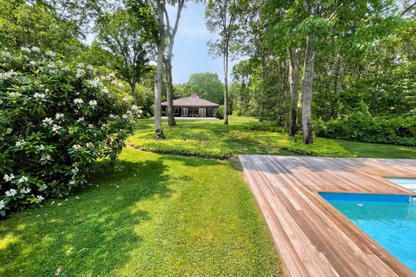 a view of a park with chairs