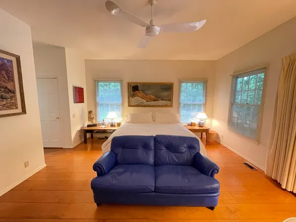 a living room with a couch and a fireplace