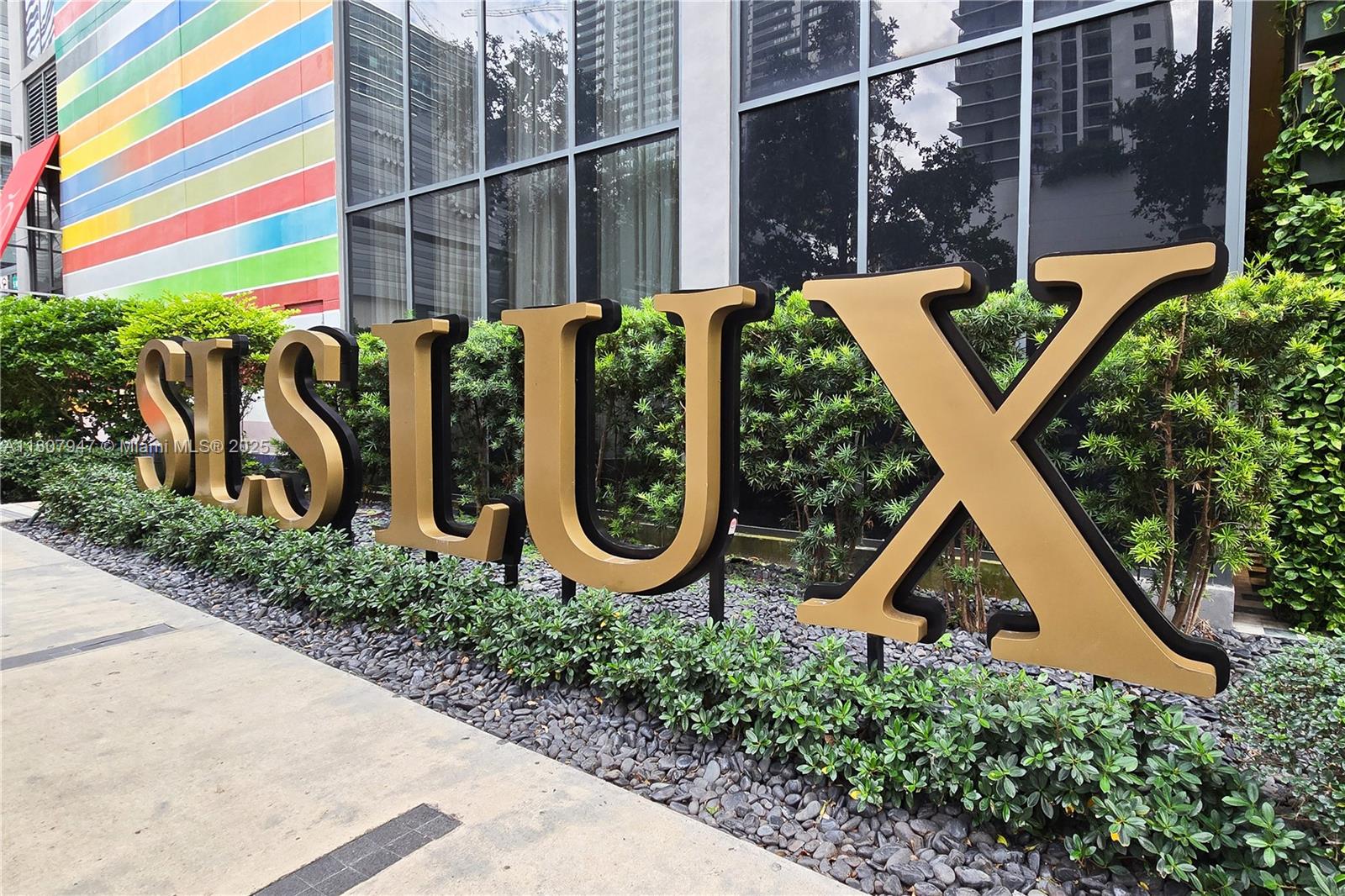 801 South Miami Avenue, Unit 2201 Miami, FL 33131 - Photo 1 of 37 a front view of a house with garden