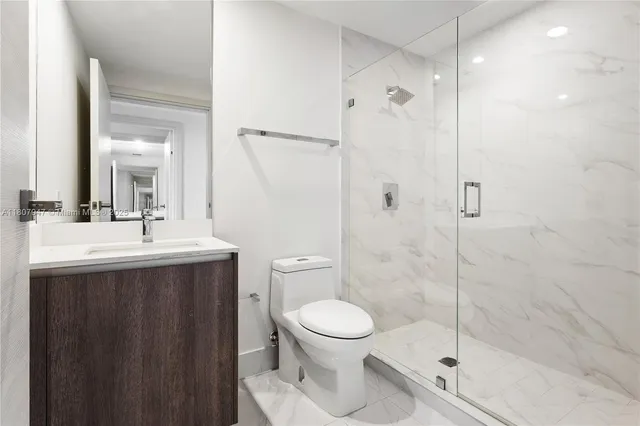a bathroom with a sink and a toilet