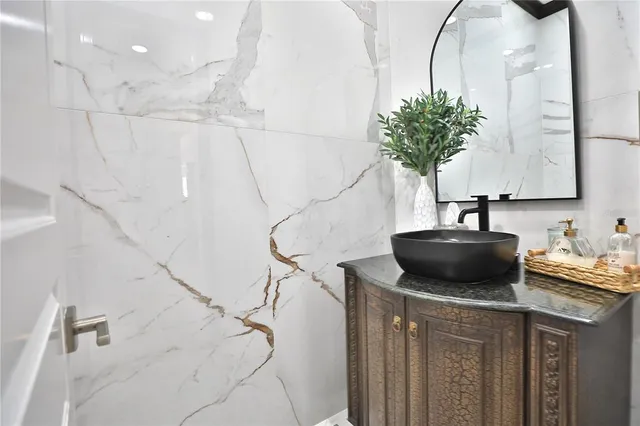 a bedroom with a bed and a table in it