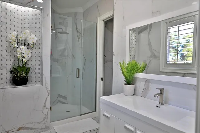 a view of lake with a garden