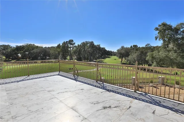 a view of a lake with a yard