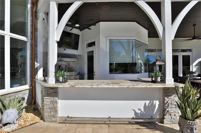 a view of yard with patio