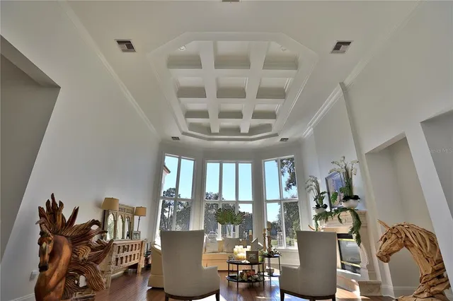 a view of a livingroom with furniture and windows