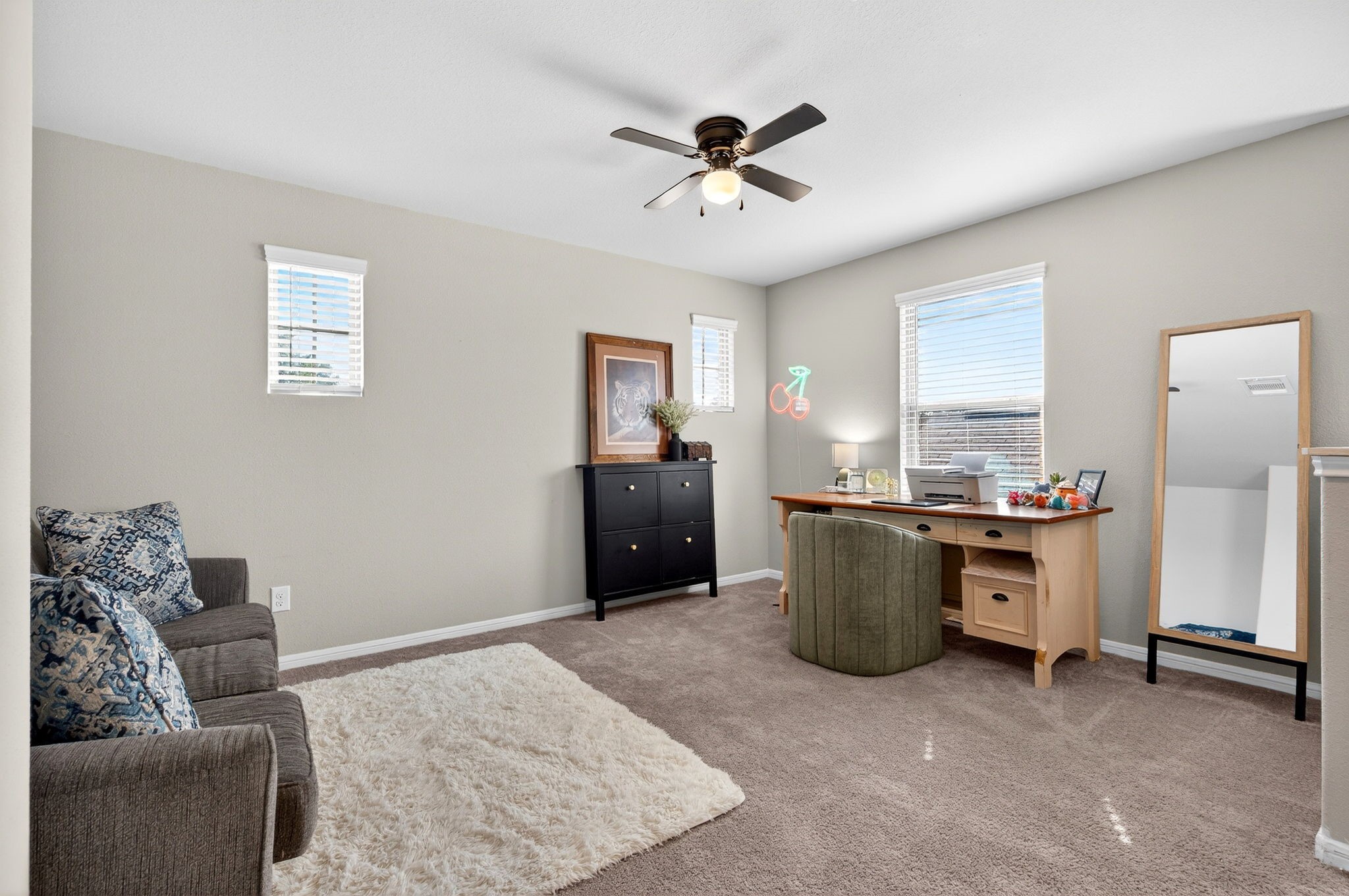 2121 Cedar Way Drive Conroe, TX 77301 - Photo 17 of 27 a living room with a couch and a dresser