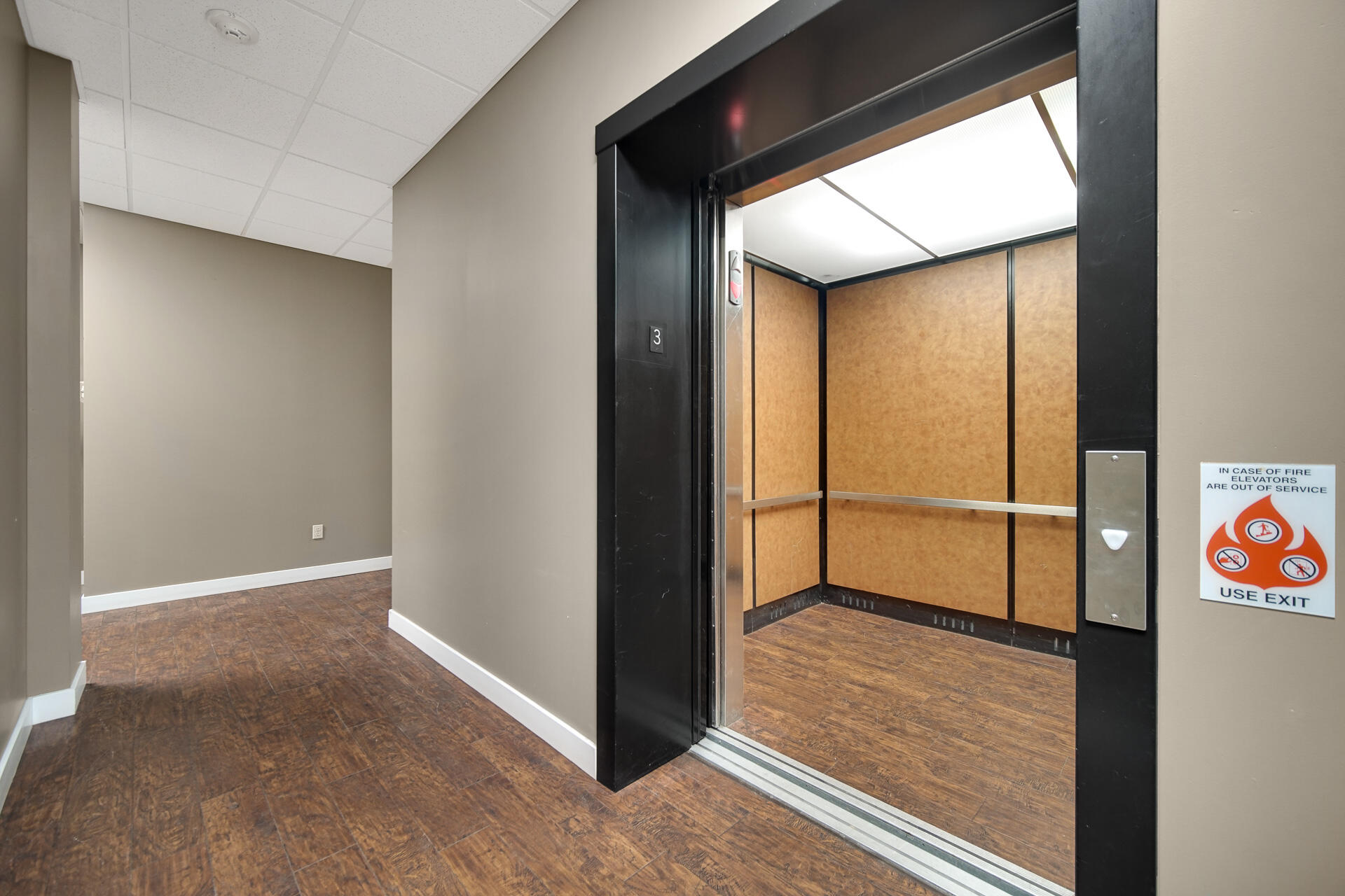 123 North Main Street, Unit 301 Crown Point, IN 46307 - Photo 2 of 25 an empty room with wooden floor and closet
