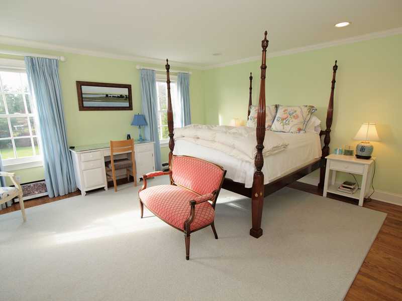 359 Mansfield Avenue Darien, CT 06820 - Photo 15 of 25 a bedroom with furniture and a large window