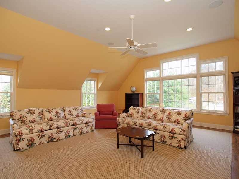359 Mansfield Avenue Darien, CT 06820 - Photo 16 of 25 a living room with furniture and a large window