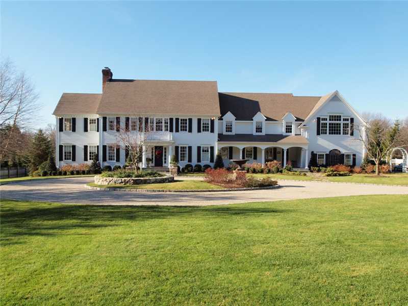 359 Mansfield Avenue Darien, CT 06820 - Photo 20 of 25 a front view of a house with swimming pool having outdoor seating