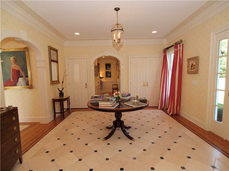 359 Mansfield Avenue Darien, CT 06820 - Photo 2 of 25 a living room with furniture a window and a chandelier