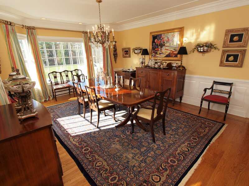 359 Mansfield Avenue Darien, CT 06820 - Photo 5 of 25 a view of a dining room with furniture and wooden floor