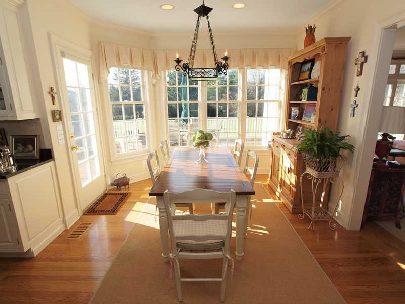359 Mansfield Avenue Darien, CT 06820 - Photo 8 of 25 a view of a dining room with furniture window and wooden floor