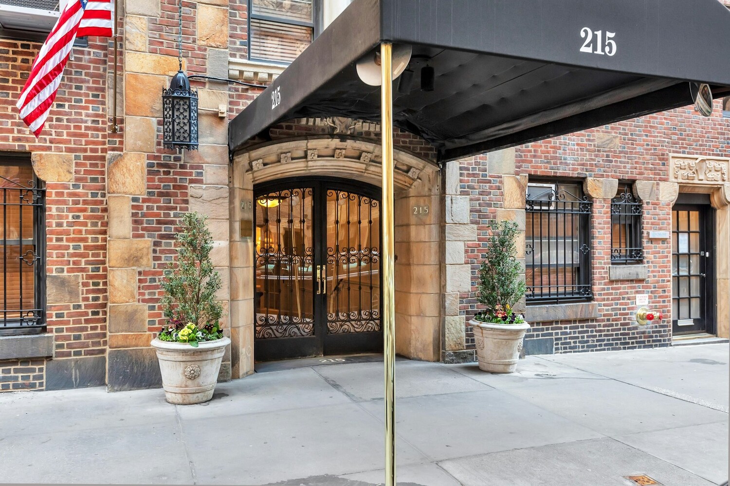 215 East 73rd Street, Unit 2A Manhattan, NY 10021 - Photo 16 of 20 a front view of a house with outdoor
