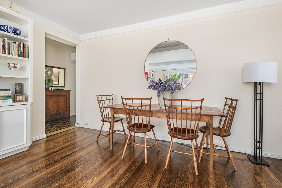 215 East 73rd Street, Unit 2A Manhattan, NY 10021 - Photo 3 of 20 a view of a dining room with furniture and wooden floor