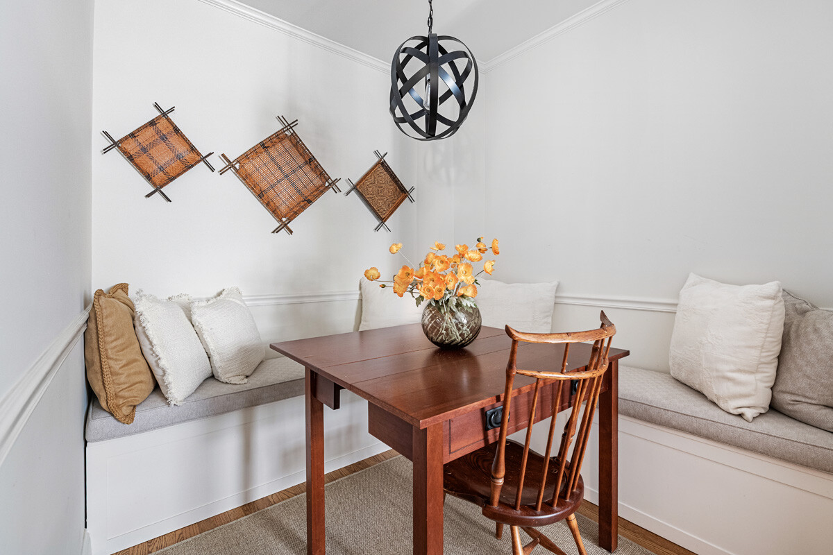 215 East 73rd Street, Unit 2A Manhattan, NY 10021 - Photo 5 of 20 a dining room with furniture and wooden floor