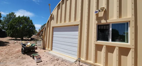 a view of a back yard of the house