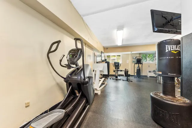 a view of a room with gym equipment
