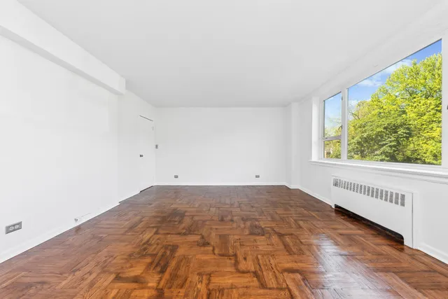 a view of an empty room and window