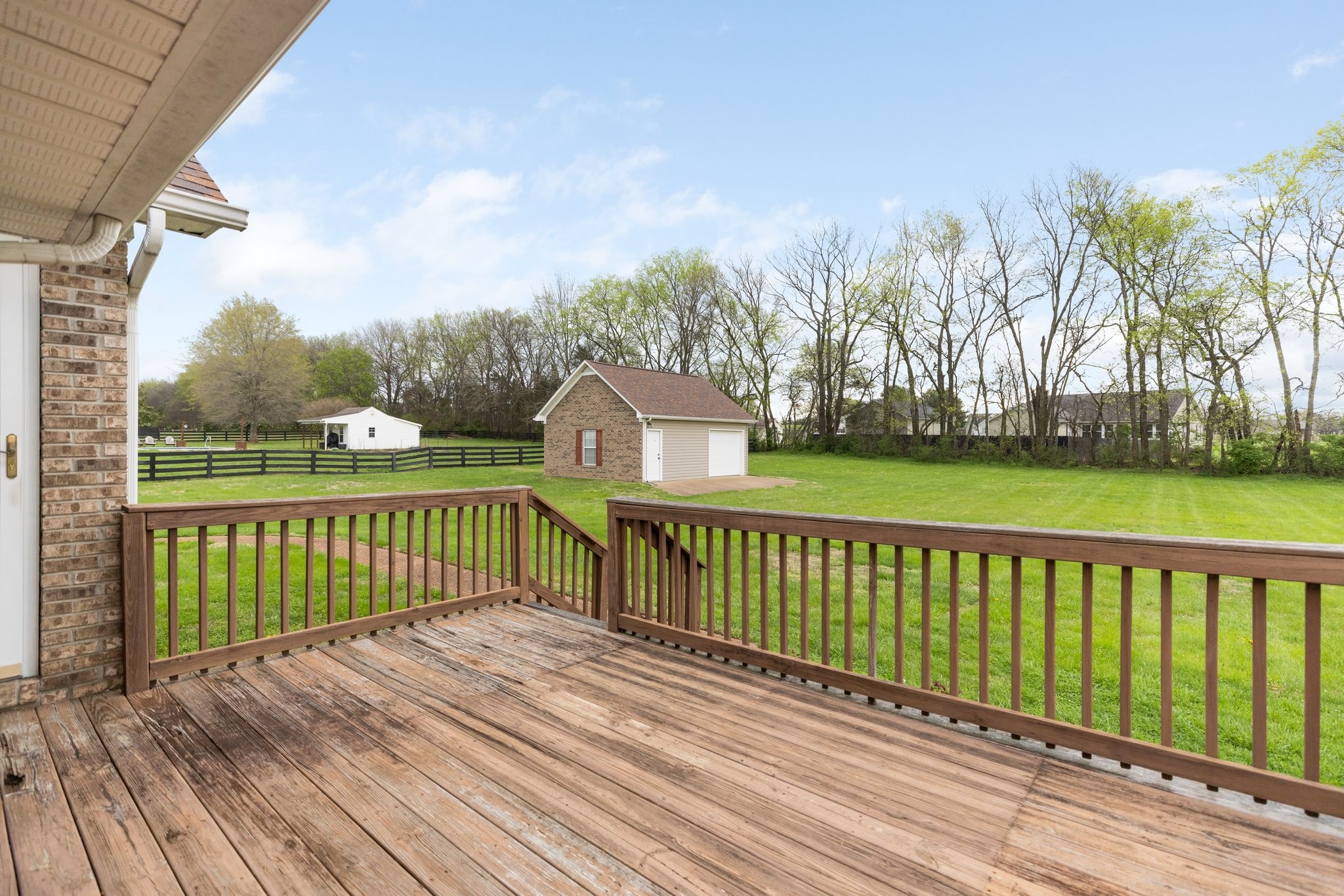 1921 Victorian Road Columbia, TN 38401 - Photo 23 of 49 a view of a wooden deck with a yard