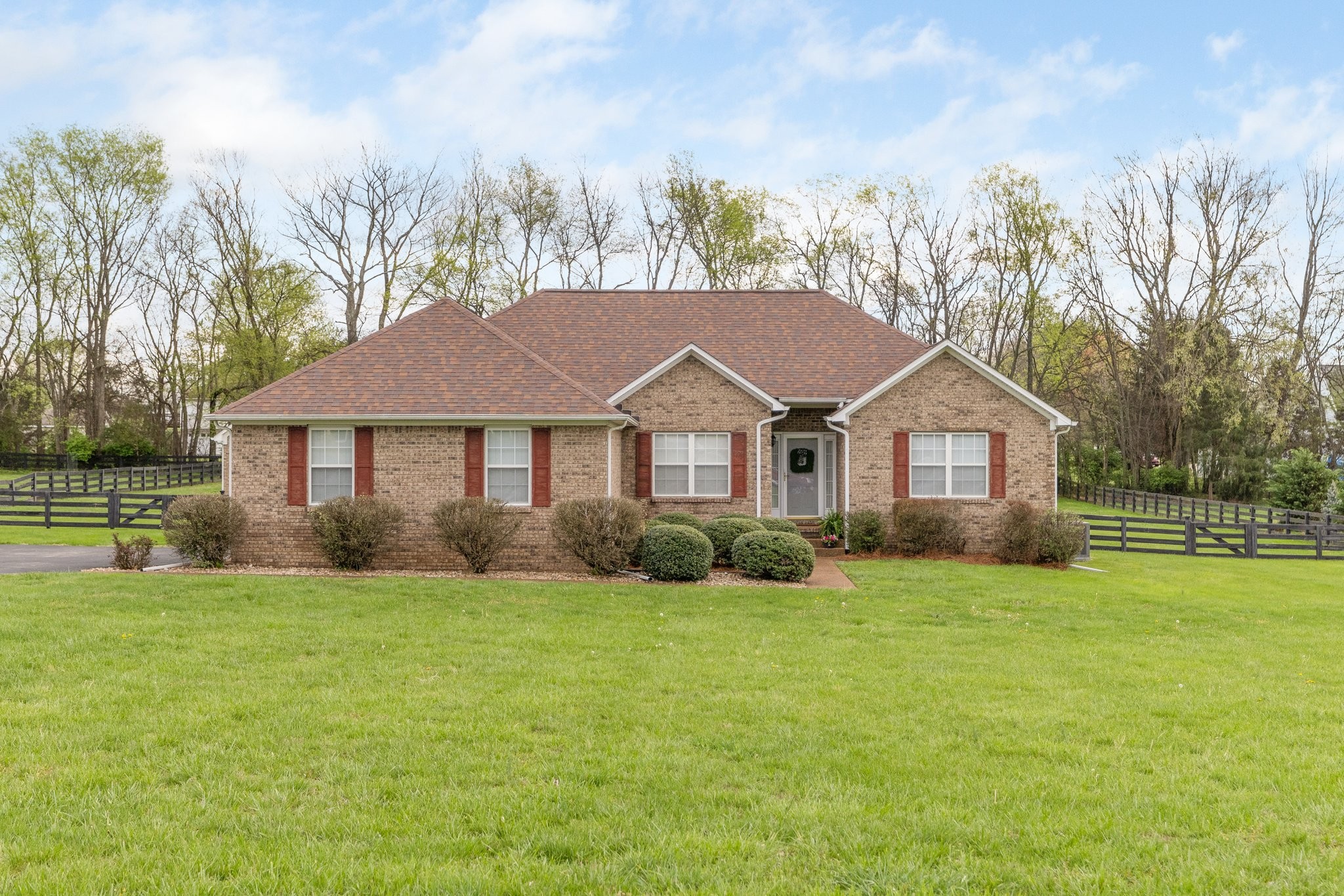 1921 Victorian Road Columbia, TN 38401 - Photo 24 of 49 a front view of a house with a yard and trees