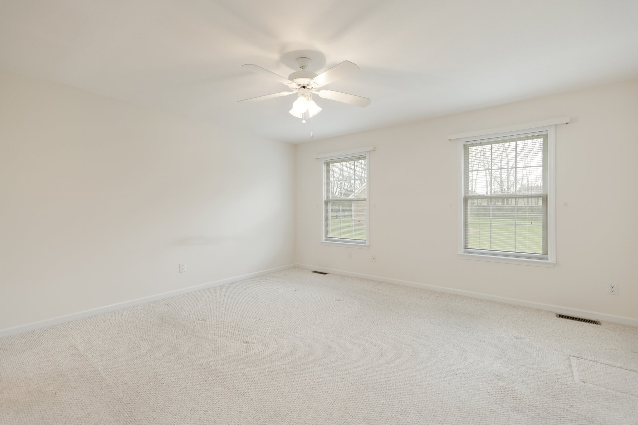 1921 Victorian Road Columbia, TN 38401 - Photo 37 of 49 an empty room with windows and chandelier fan