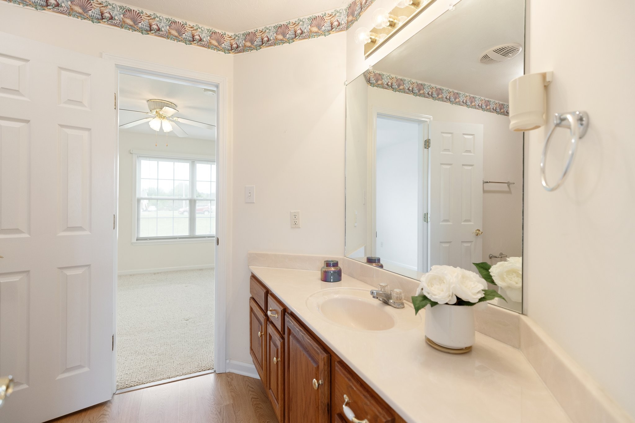 1921 Victorian Road Columbia, TN 38401 - Photo 46 of 49 a bathroom with a double vanity sink and mirror