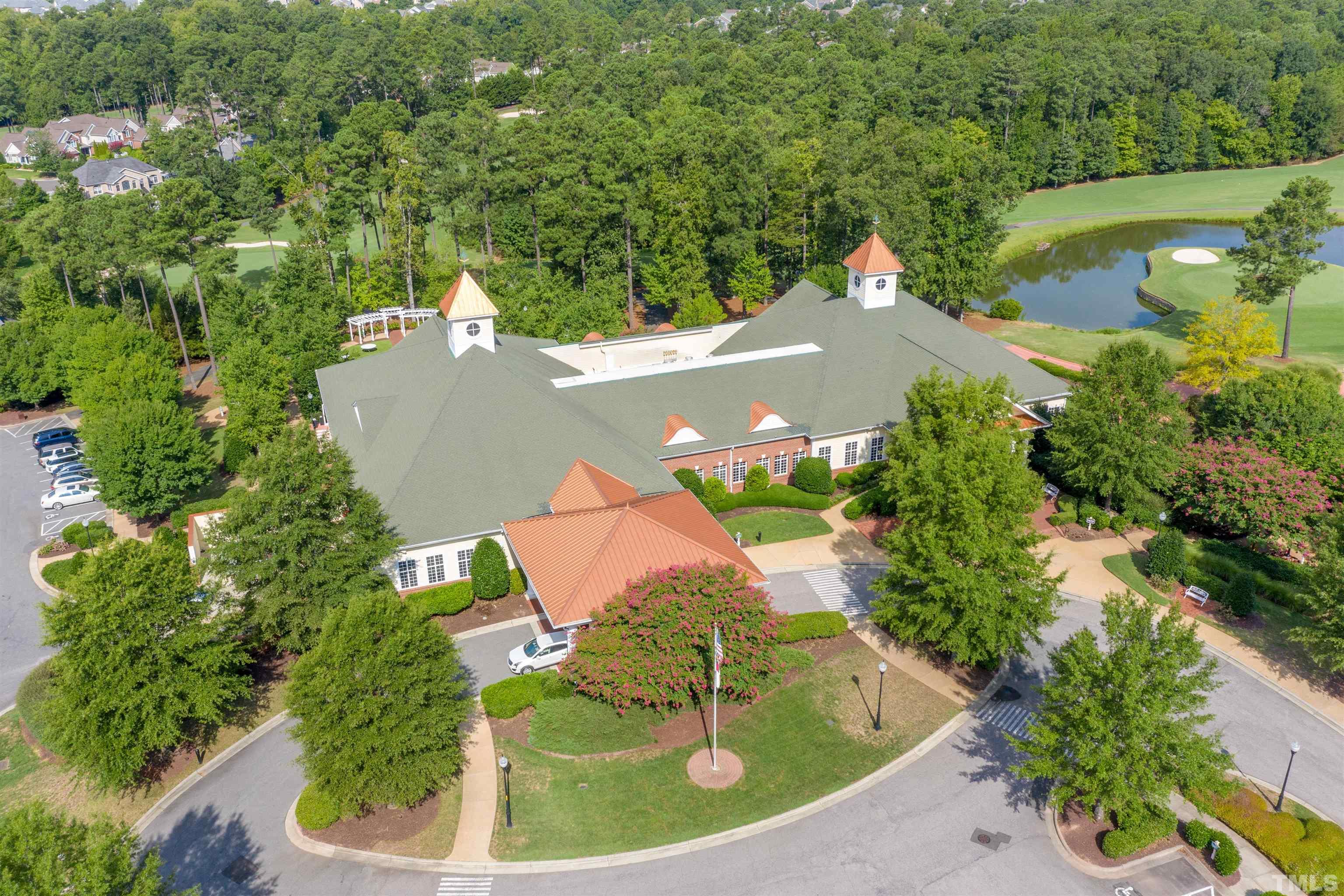 11313 Ridgegate Drive Raleigh, NC 27617 - Photo 80 of 82 an aerial view of a house with a garden and swimming pool