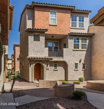 a front view of a house with parking