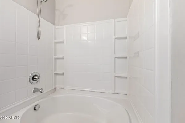 a bathroom with a bathtub