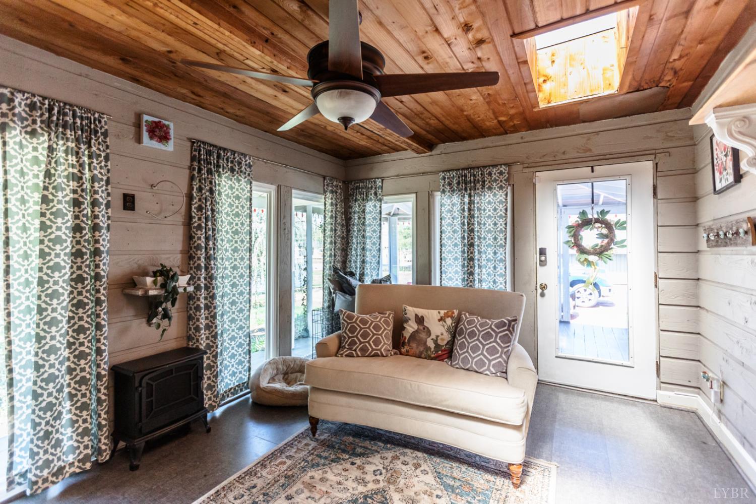 151 Burke Street Appomattox, VA 24522 - Photo 28 of 75 a living room with furniture and a large window
