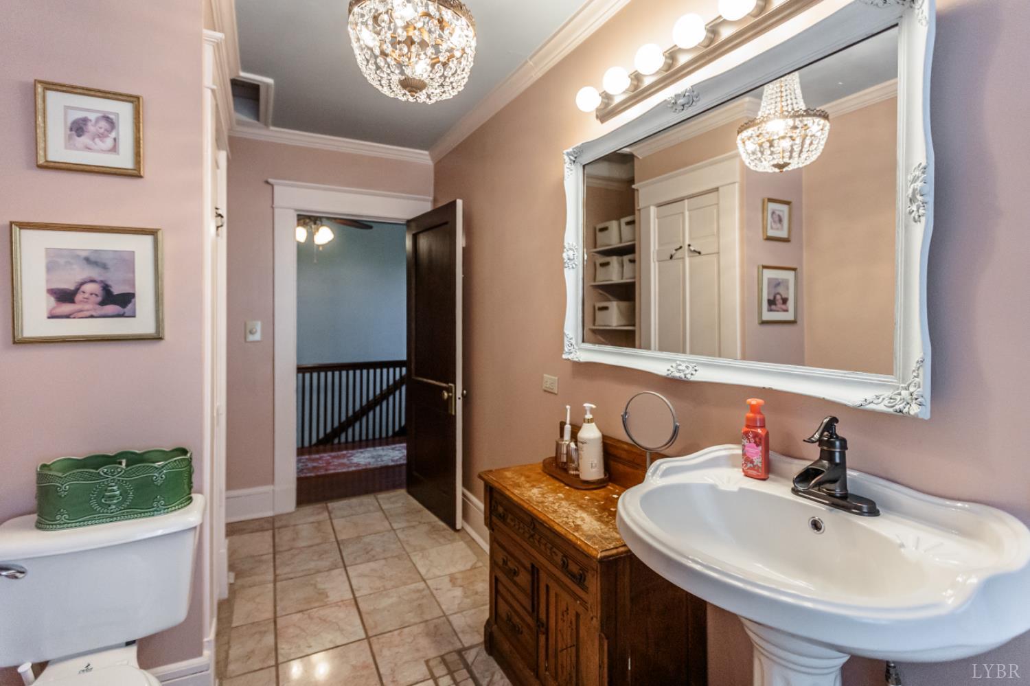 151 Burke Street Appomattox, VA 24522 - Photo 53 of 75 a bathroom with a sink a toilet and a mirror