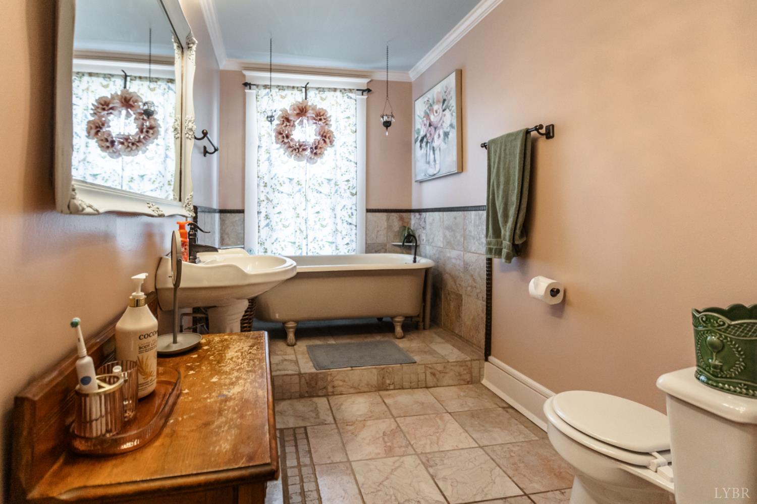 151 Burke Street Appomattox, VA 24522 - Photo 54 of 75 a bathroom with a sink toilet and shower