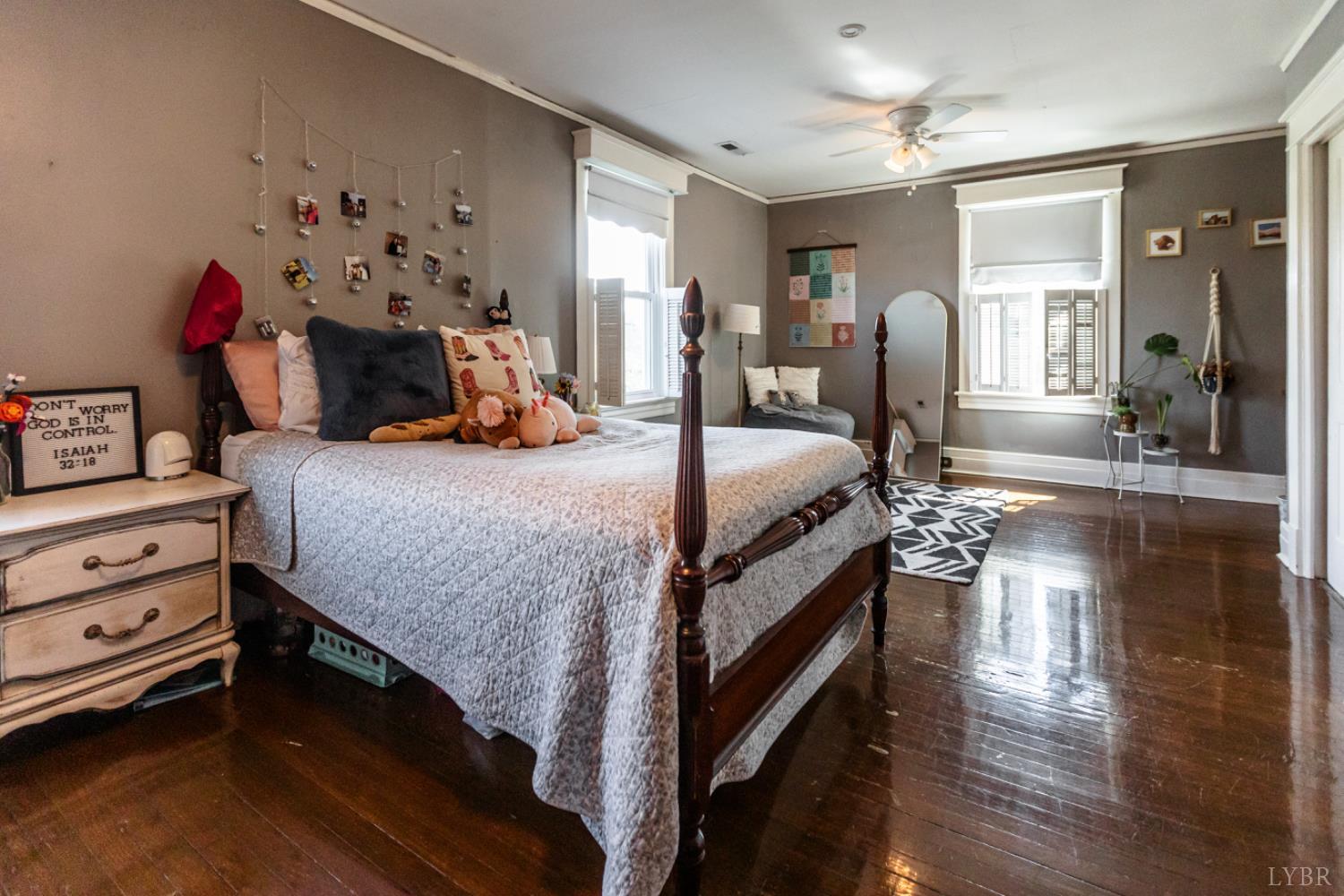 151 Burke Street Appomattox, VA 24522 - Photo 59 of 75 a bedroom with a bed and wooden floor