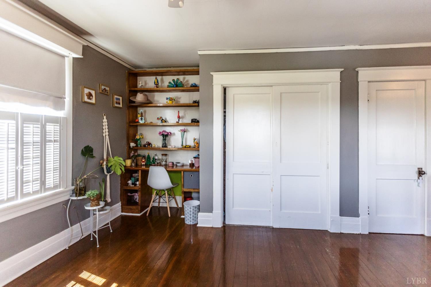 151 Burke Street Appomattox, VA 24522 - Photo 62 of 75 a view of a room with wooden floor and furniture