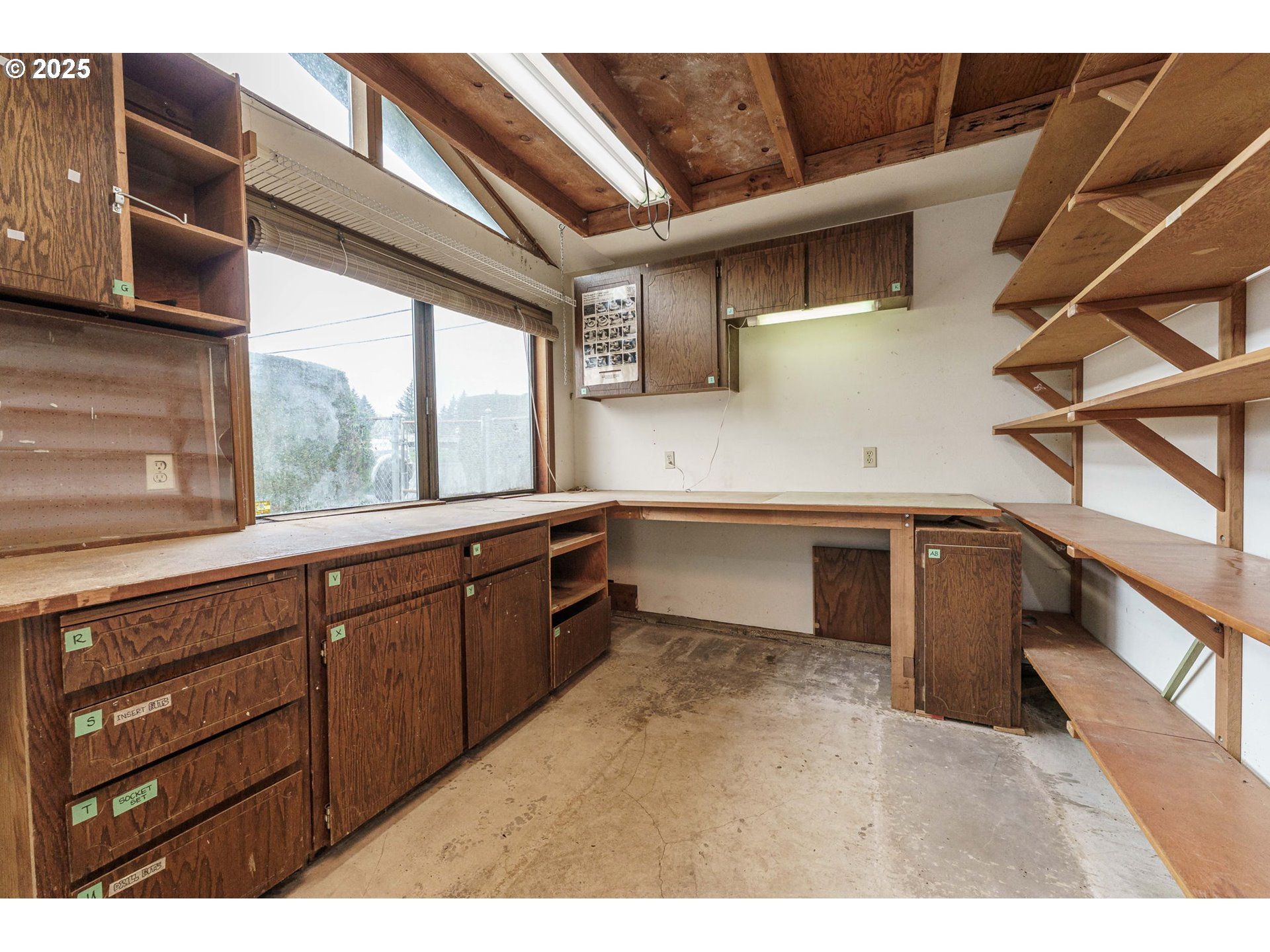 26690 Southeast Kelso Road Boring, OR 97009 - Photo 23 of 48 a kitchen with cabinets and window