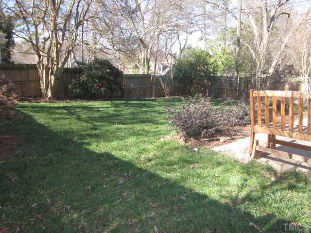 2031 Reaves Drive Raleigh, NC 27608 - Photo 8 of 25 Wonderful all brick ranch bungalow in fabulous location! All bedrooms have access to full bathroom! That's a rare find in older homes inside the beltline! Walking distance to Five Points and Fallon Park! Back Yard