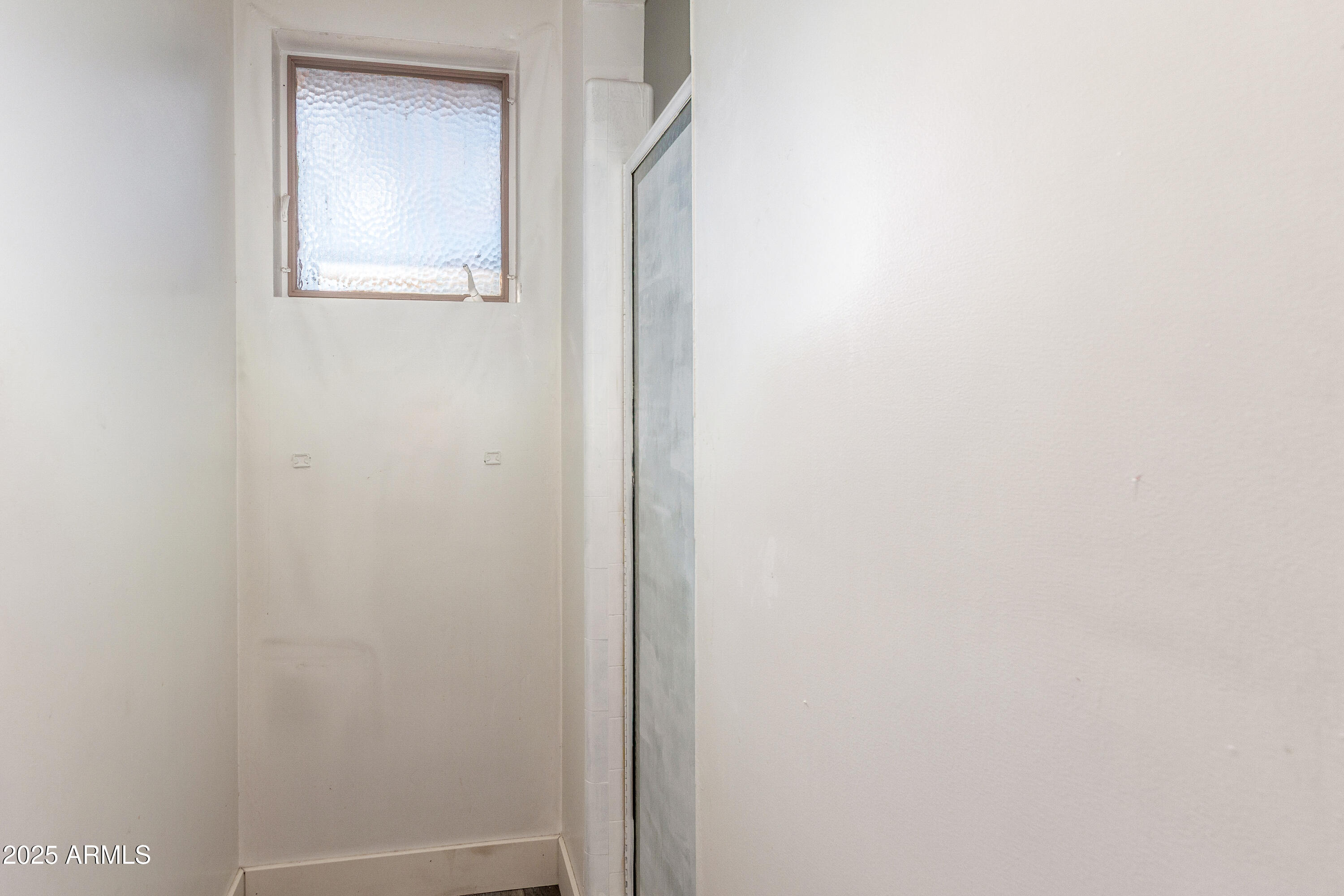 413 East 3rd Street Eloy, AZ 85131 - Photo 24 of 44 a bathroom with a window