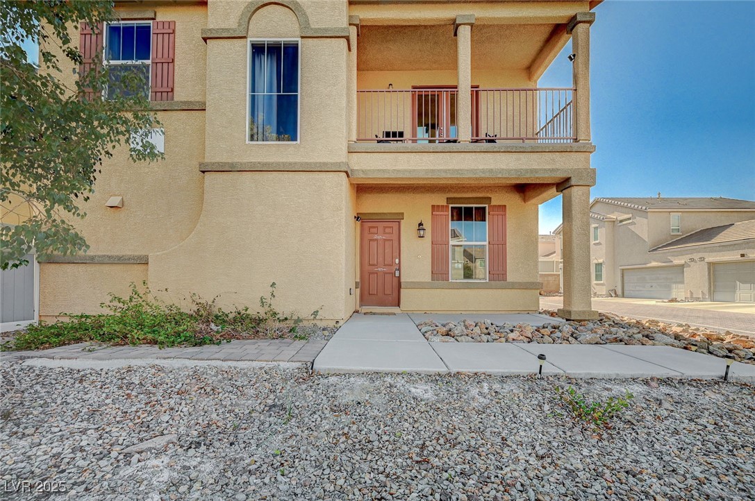 971 Sable Chase Place Henderson, NV 89011 - Photo 2 of 48 Entrance with balcony at primary room, above front door.