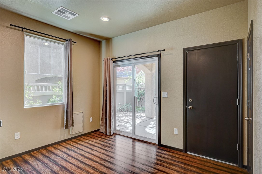971 Sable Chase Place Henderson, NV 89011 - Photo 9 of 48 Dining room. Entry to backyard, and door entry to garage.