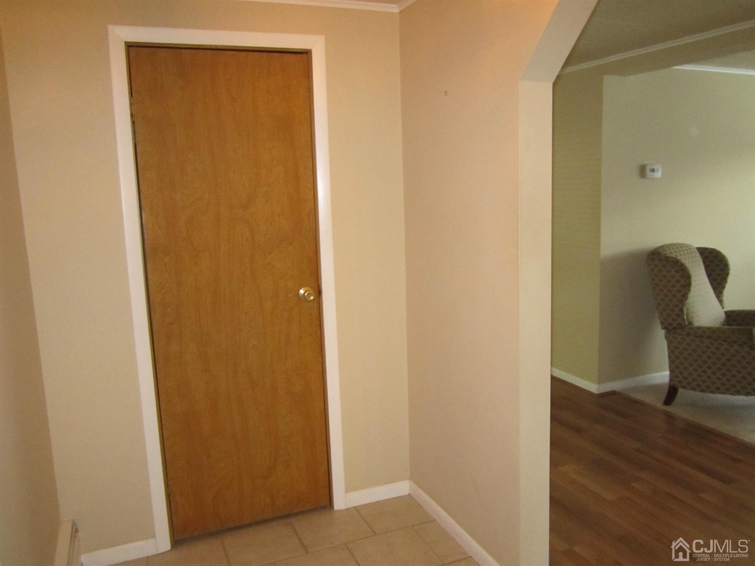 61 Whitman Road North Brunswick, NJ 08902 - Photo 11 of 16 Carpeted living room
