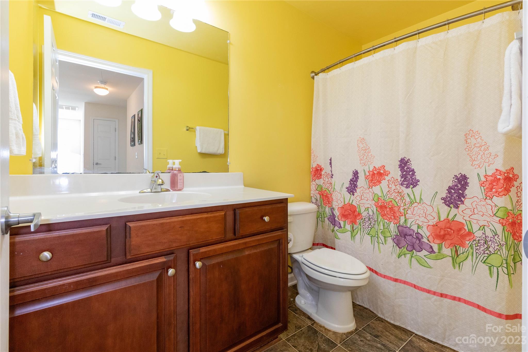 101 Ledbetter Road Arden, NC 28704 - Photo 14 of 21 a bathroom with a toilet sink and mirror