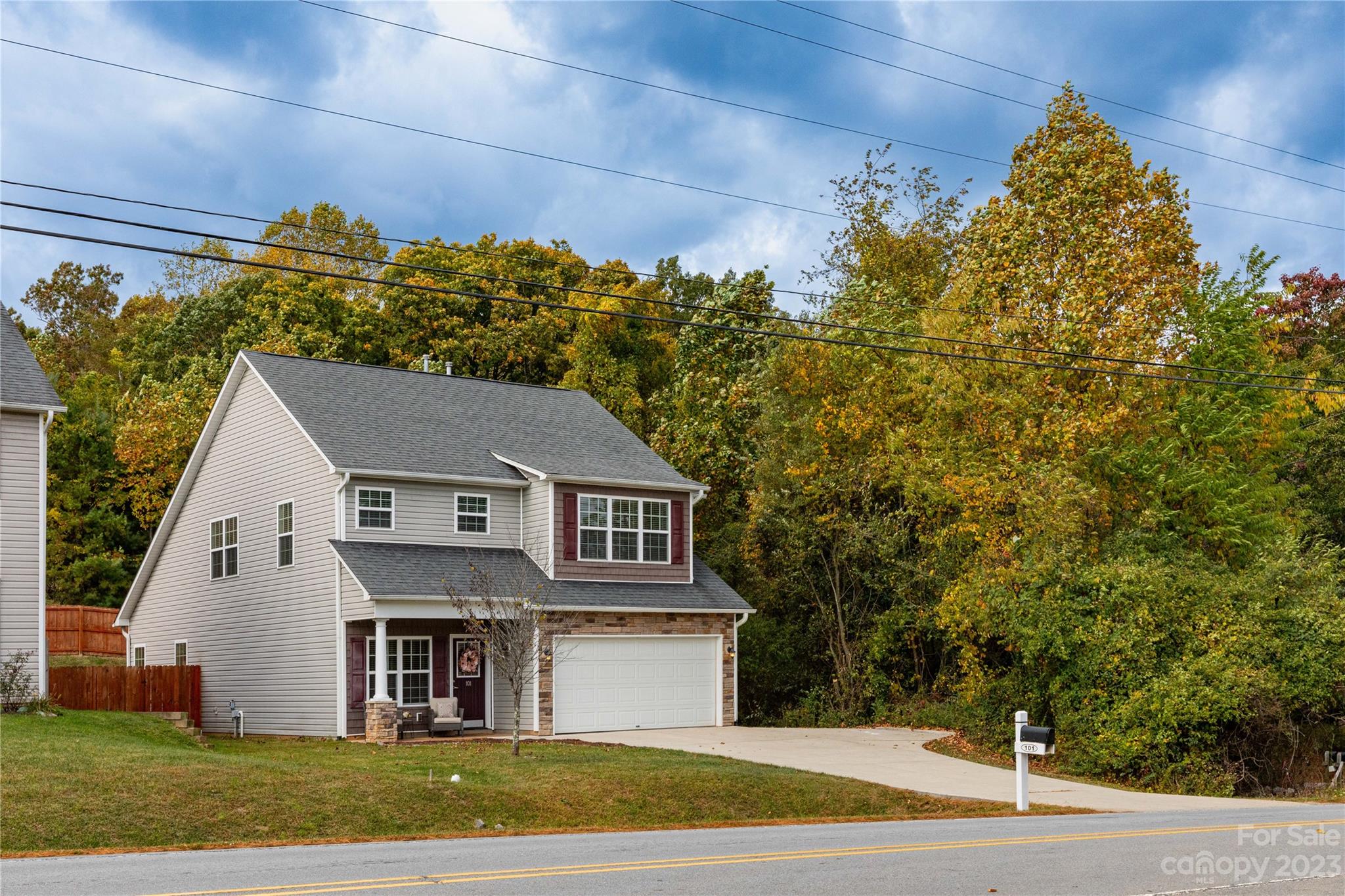101 Ledbetter Road Arden, NC 28704 - Photo 18 of 21 a view of a house with a yard and plants