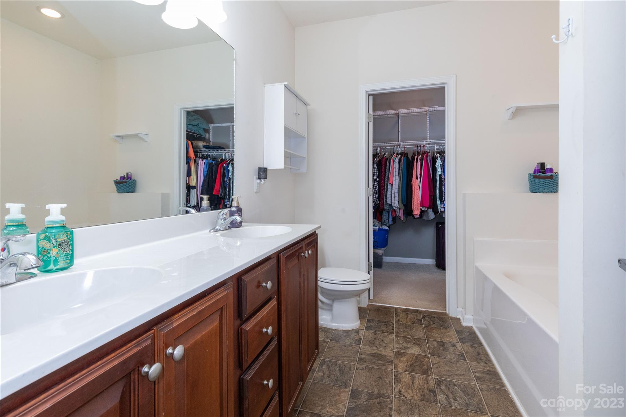 101 Ledbetter Road Arden, NC 28704 - Photo 9 of 21 a bathroom with a sink and a mirror