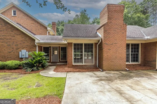 a view of a park with a tree