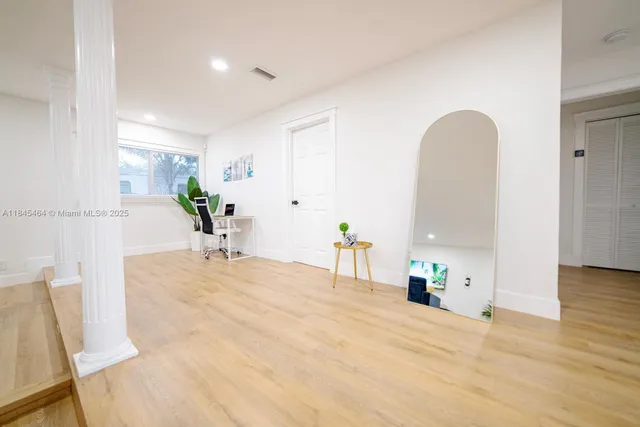 a view of a livingroom with a furniture