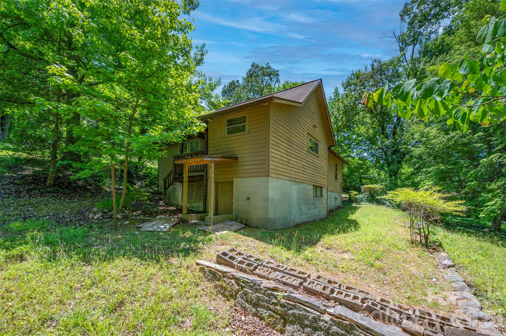 77 1st Street Tryon, NC 28782 - Photo 10 of 20 a view of a backyard