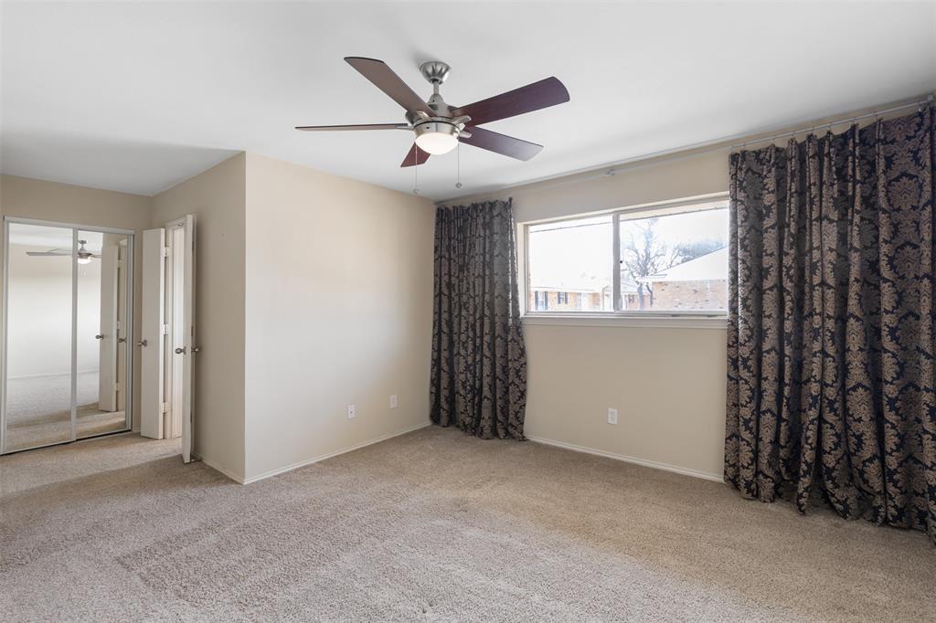 4709 Skillman Street, Unit D Dallas, TX 75206 - Photo 14 of 28 a view of an empty room with a window