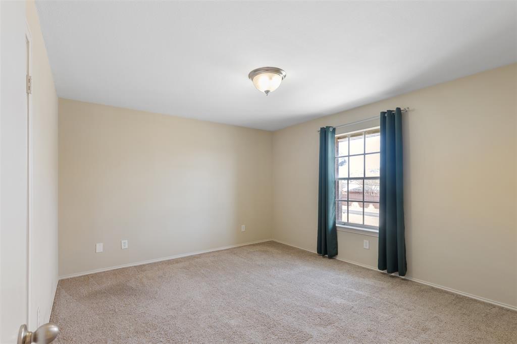 4709 Skillman Street, Unit D Dallas, TX 75206 - Photo 20 of 28 an empty room with windows